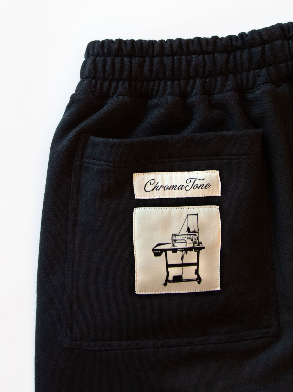 RAISED EMBROIDERY SWEATPANTS
